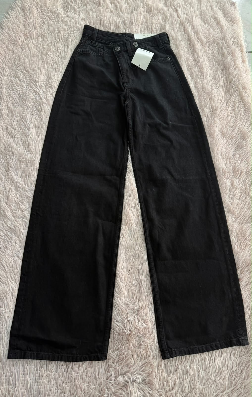 Jeans negros de cintura cruzada Bershka