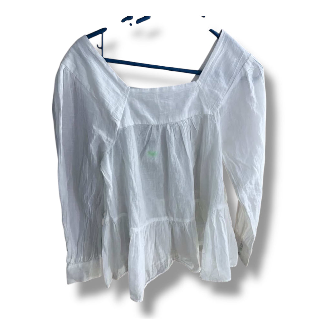 Blusa ((AE)