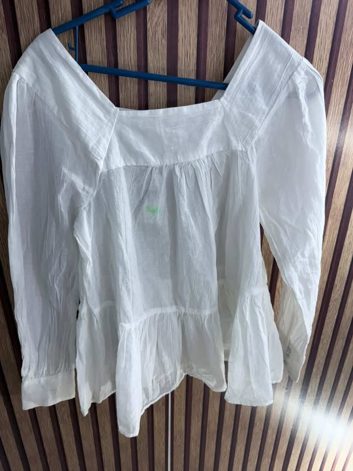 Blusa ((AE)